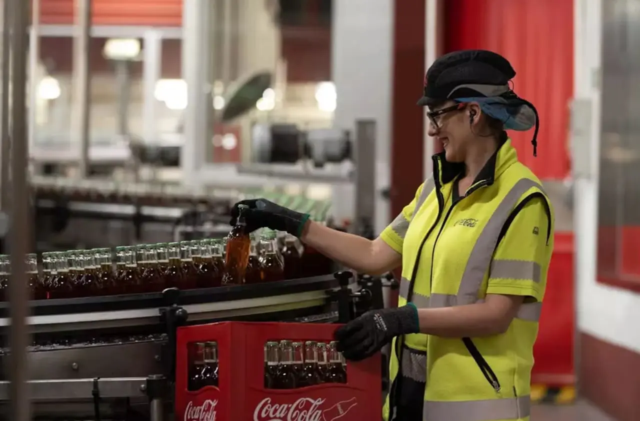 Empleada de Coca Cola