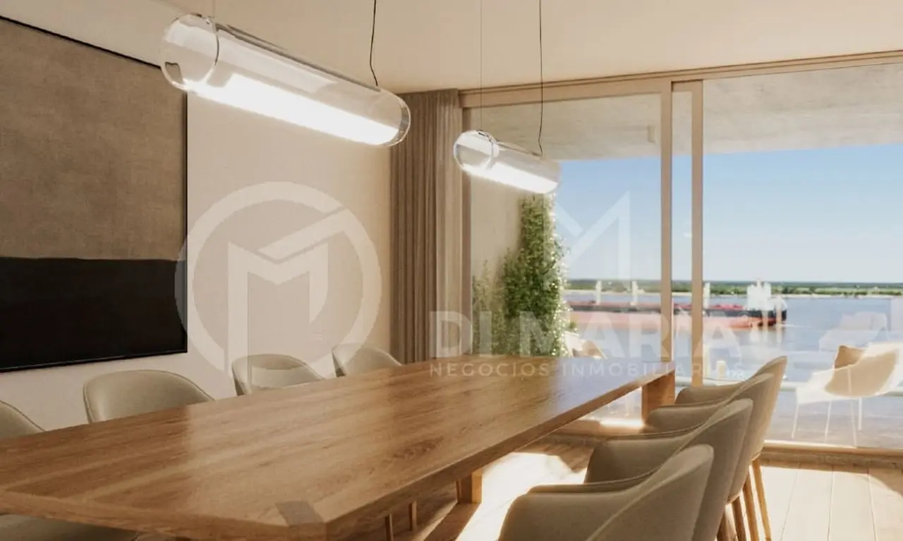 Interior de lujo con una amplia mesa de madera, sillones elegantes y ventanales con vista al río