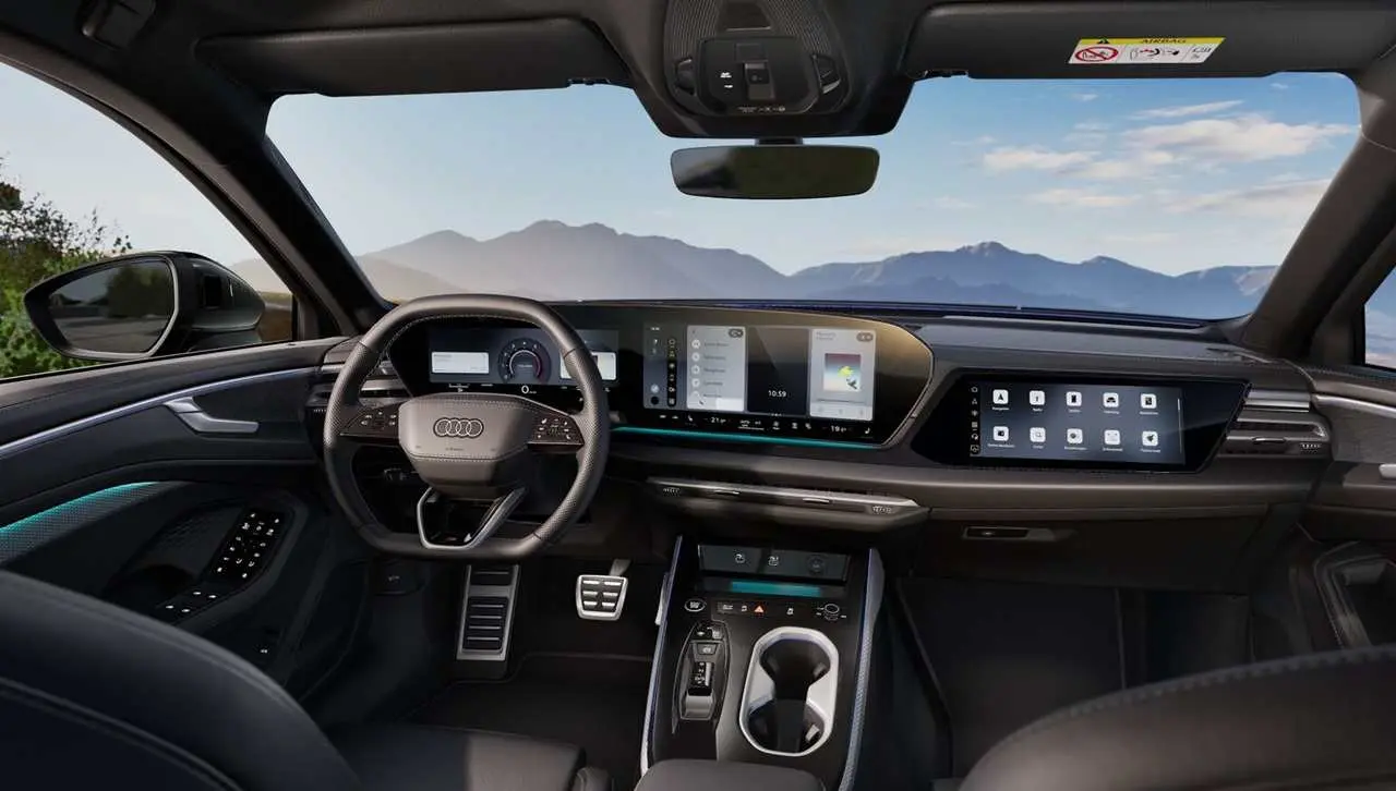 Interior delantero del volante y tablero Audi A6. Foto oficial