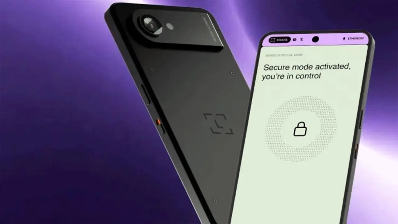 Dispositivo móvil Ledger Atom de color negro con pantalla AMOLED encendida que muestra la interfaz del sistema aislado Ledger OS
