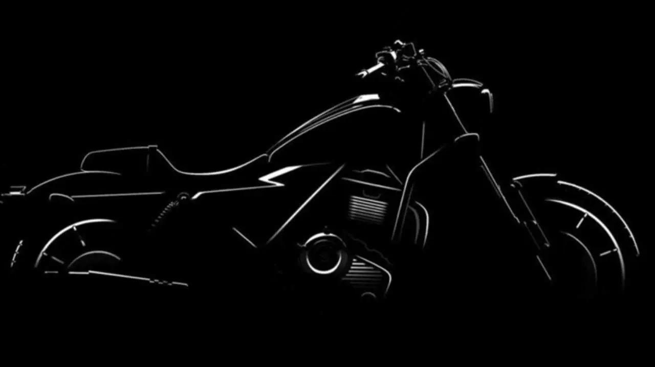 Moto Harley Davidson color negra sobre un fondo negro