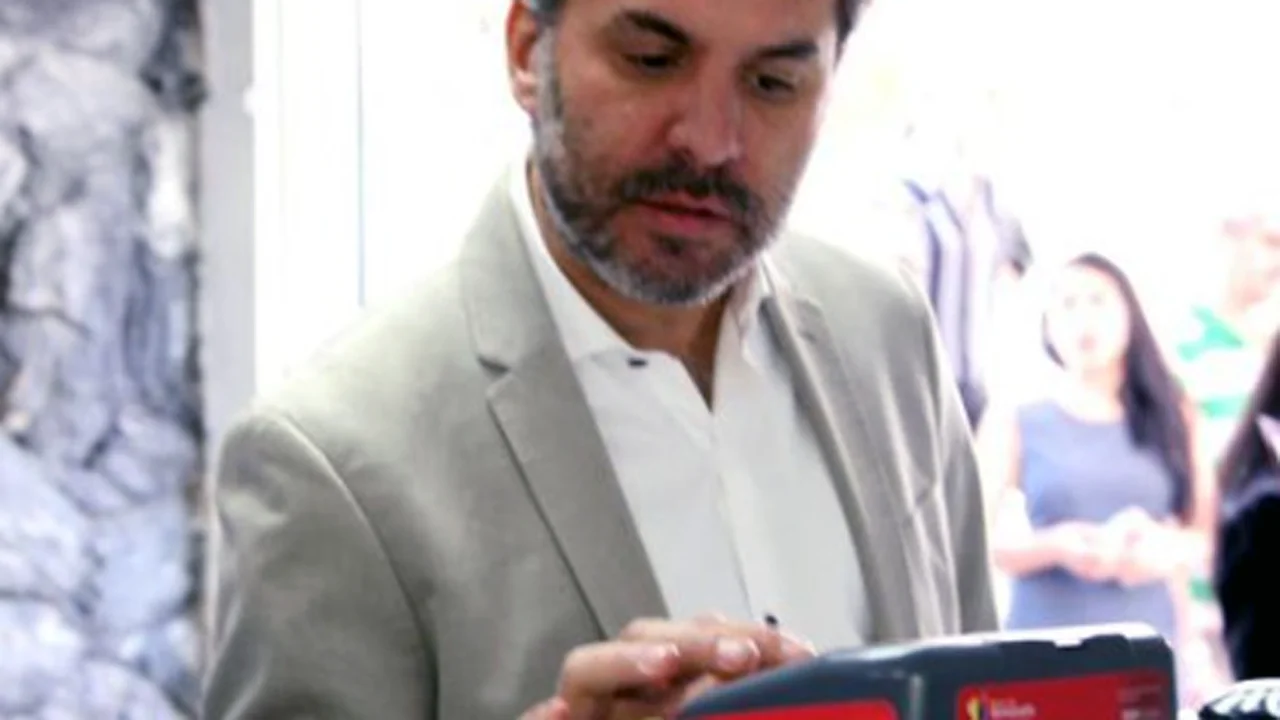 Quiénes son los argentinos dueños de la empresa a cargo del sistema electoral en Venezuela