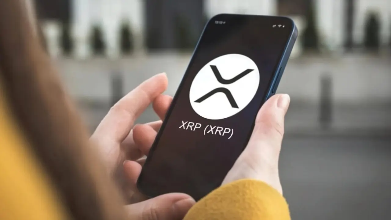 A cuanto esta xrp (99) foto