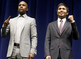 Precio récord para ver por TV a Mayweather vs. Pacquiao, quienes cobrarí­an 180 y 120 millones de dólares
