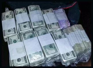 Terminaron de contar el dinero que tení­a el ex funcionario K en bolsos: u$s8.982.047