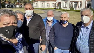 La 'incómoda' reunión entre CGT, un piquetero y el FMI