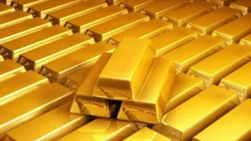 El oro rompe récords y este experto predice que terminará con la hegemonía del dólar