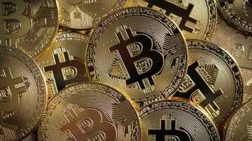 Bitcoin récord: cómo comprar una moneda en Amazon y recibirla en la puerta de casa