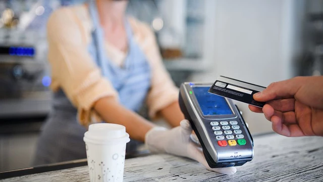 Warn for extra charge when paying with debit card