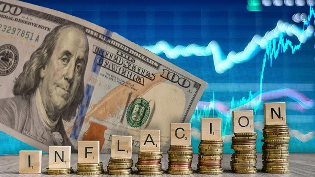 Dólares y monedas junto a un gráfico financiero reflejan inflación y expectativas del mercado