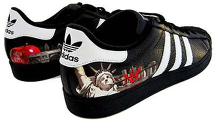 Adidas eleva casi un 80% sus ganancias pero prevé una caí­da para 2009