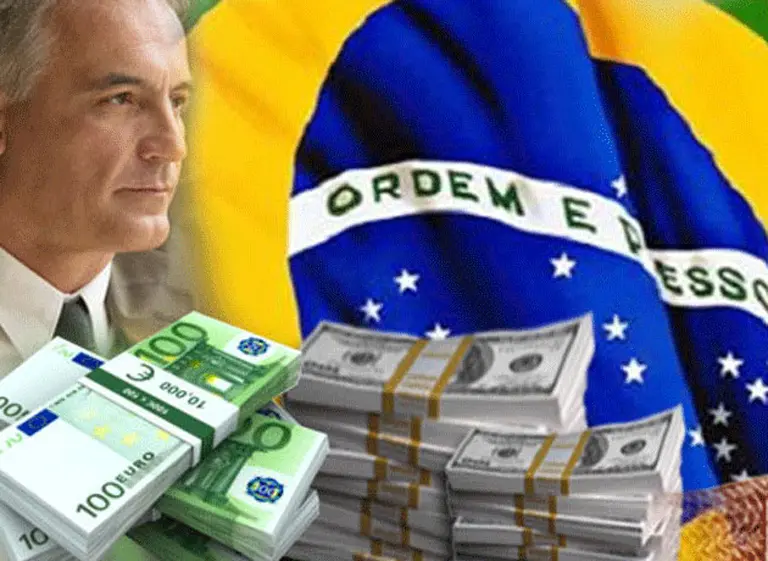 La devaluación del real seguirá en 2015 y le suma presión a la Argentina