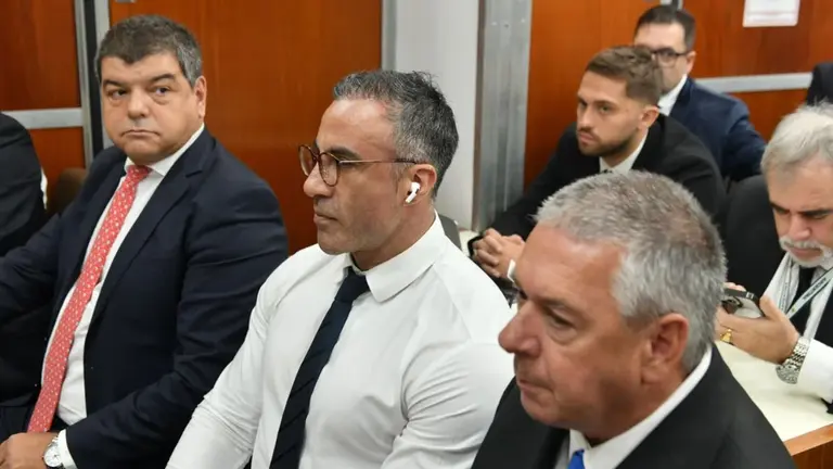 El médico Leopoldo Luque agredió a un periodista