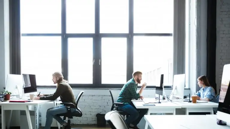 Las dos caras del mismo negocio: por qué WeWork se achica y HIT crece en el mercado de oficinas