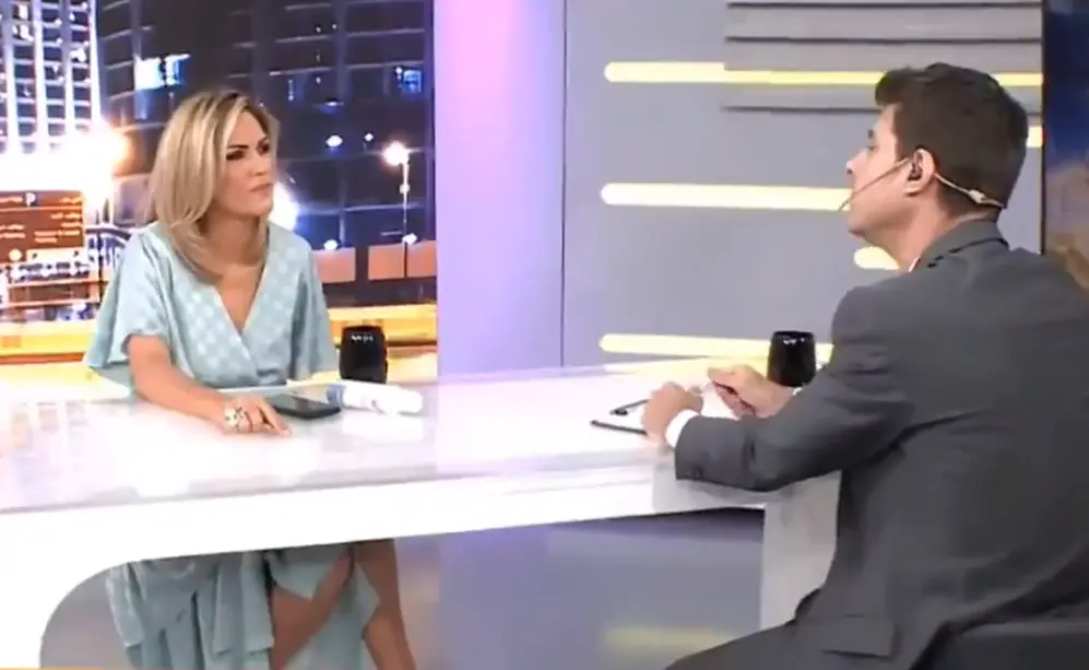 El momento del diálogo entre ambos periodistas