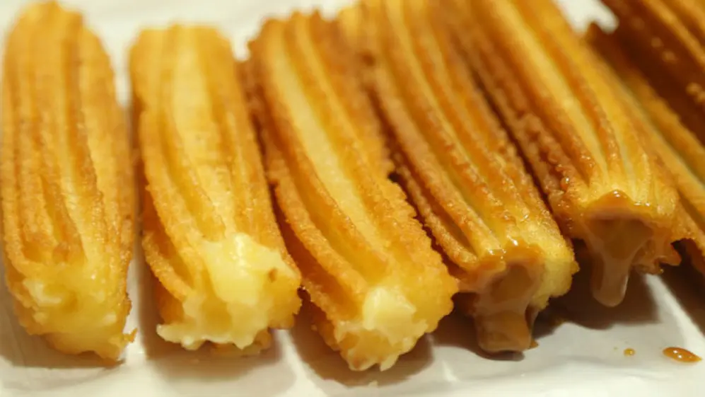 Churros de crema pastelera y los clásicos de dulce de leche.
