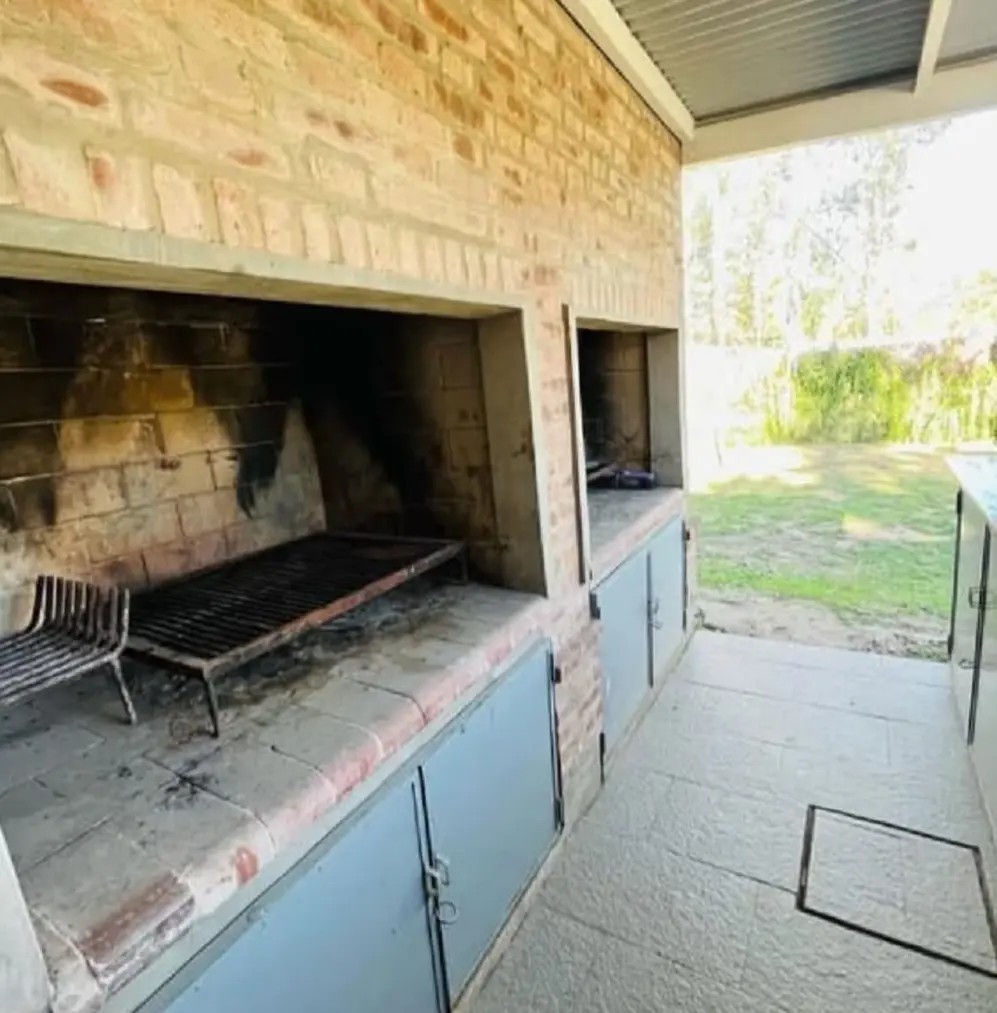 Parrilla para realizar un asado en Descanso del Molino