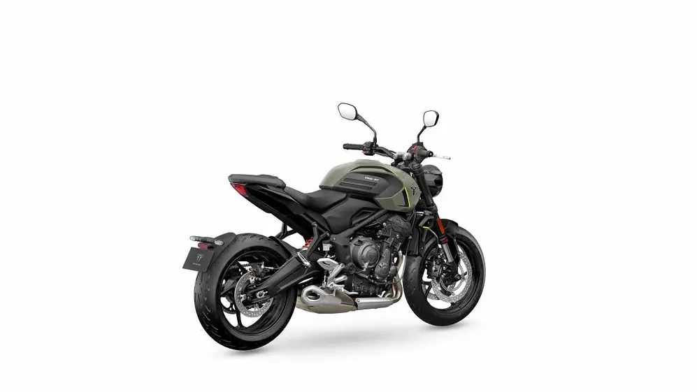 Moto modelo Trident 600 de atrás y de perfil color negra sobre un fondo blanco
