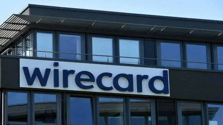 Un logotipo de Wirecard en la fachada de la sede central de la compañía alemana de pagos en línea, el 24 de junio de 2020 en Aschheim, cerca de Múnich